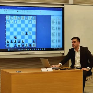 Orxan Abdulov giving a chess lecture